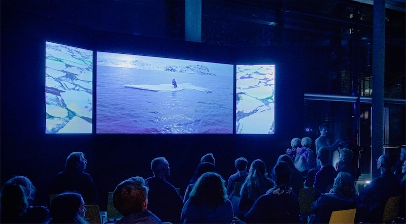 Installation view of Adam Sébire's video triptych AnthropoScene IV : Adrift (∆Asea-ice) at the Long Night of the Munich Museums, October 2019.